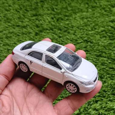 Diecast Rastar Mobil Toyota Corolla White Scale 1/43