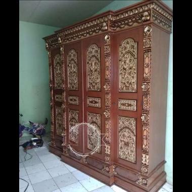 Lemari pakaian jati 4 pintu motif gebyok ukir Jepara