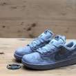 nike sb dunk low pro qs reigning champion grey