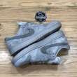 nike sb dunk low pro qs reigning champion grey